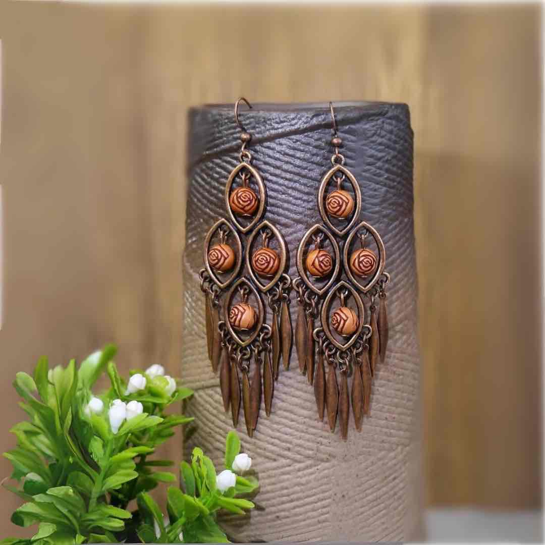 Image of an earring - Premium | Hanging Rose Ball Gold Dangler Earrings by Zuzus Trove