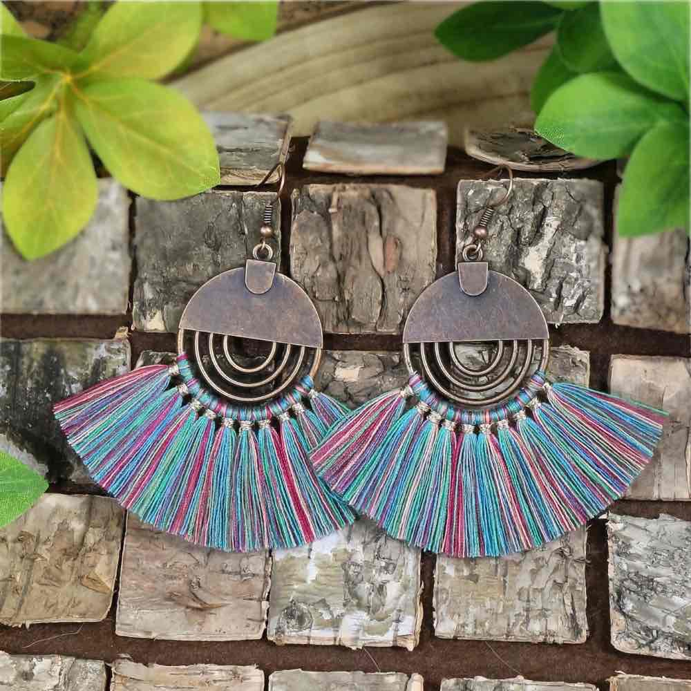 Close-up of unique oxidised earring showing arched metal detail and multi-color fringe - Left earring detail | Zuzu's Trove