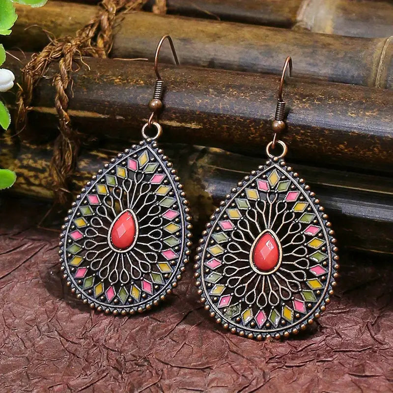 Antique finish and textured metal of unique oxidised dangle earring, showing craftsmanship | Zuzu's Trove