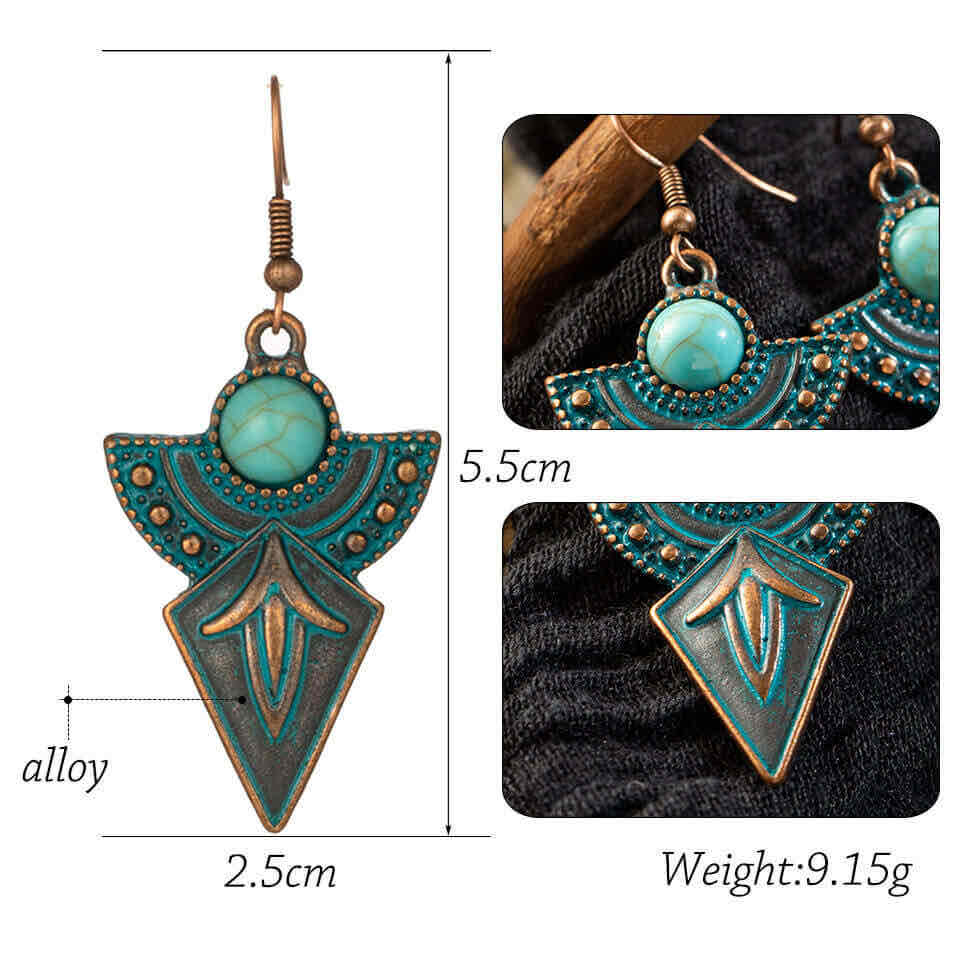Close-up of the lower, shield-shaped part of the left antique turquoise earring, showing leaf-like patterns and oxidised fini