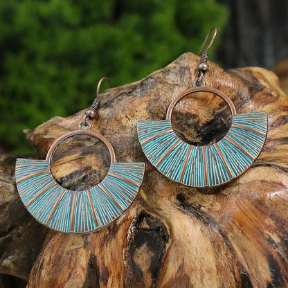 Oxidised blue patina fan dangle earrings with sunburst design - front view | Zuzu's Trove