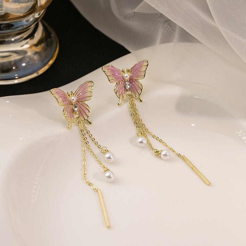 Image of an earring - Butterfly Earrings - Luxury Chain Pearl Dangle Earrings - Hypoallergenic Alloy - Pink by Zuzus Trove