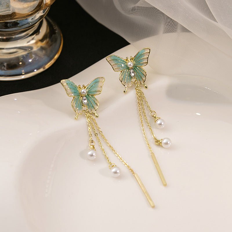 Front view of an earrings - Butterfly Earrings - Luxury Chain Pearl Earrings - Hypoallergenic Alloy - Green Zuzus Trove - Zuzus Trove