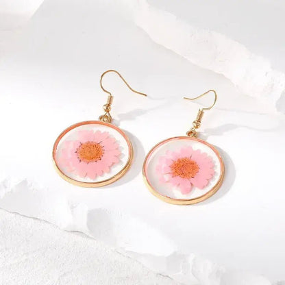 Image of an earring - Flower Blossom Earrings (Real Pressed Flowers) by Zuzus Trove