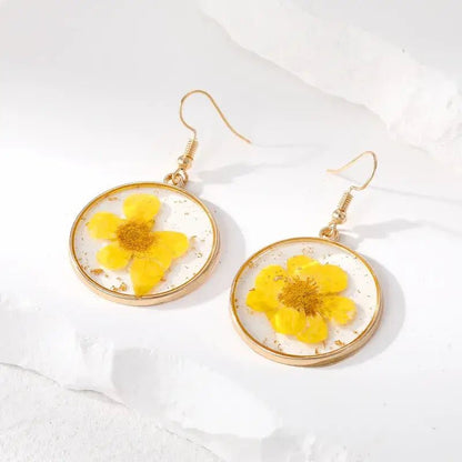 Image of an earring - Flower Blossom Earrings (Real Pressed Flowers) by Zuzus Trove