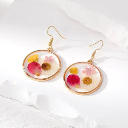 Image of an earring - Flower Blossom Earrings (Real Pressed Flowers) by Zuzus Trove
