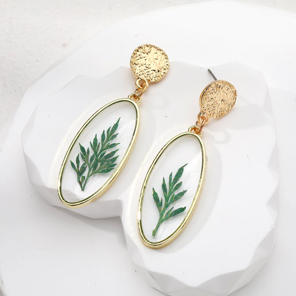 Image of an earring - Gold Earrings - Pressed Leaf Earrings by Zuzus Trove