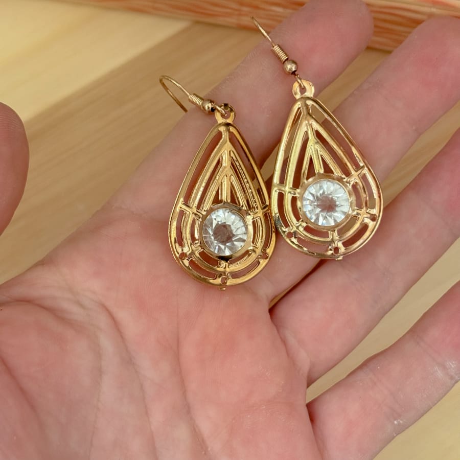 Front view of an earrings - golden drop crystal earrings - Zuzus Trove