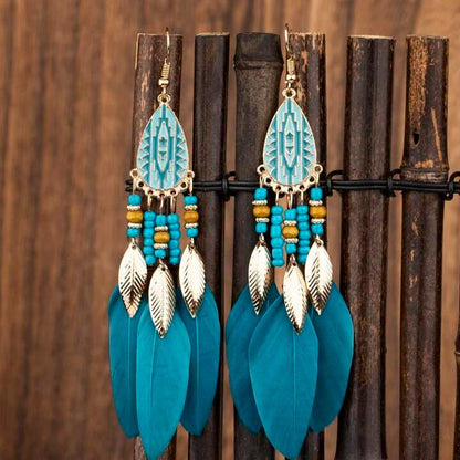 Front view of an earrings - Long Earrings - Blue Feather Earrings - Zuzus Trove