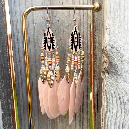 Front view of an earrings - Pink Earrings - Long Pink Feather Tribal Earrings - Zuzus Trove