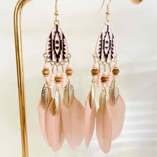 Front view of an earrings - Pink Earrings - Long Pink Feather Tribal Earrings - Zuzus Trove