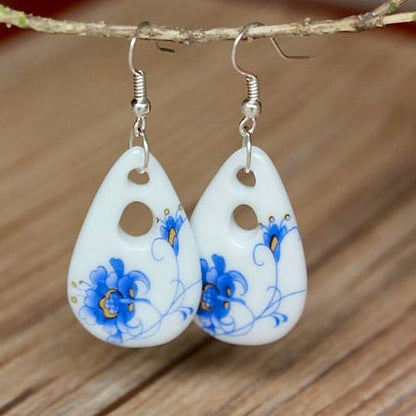 Front view of an earrings - Porcelain Flower Earrings - White Earrings - Zuzus Trove