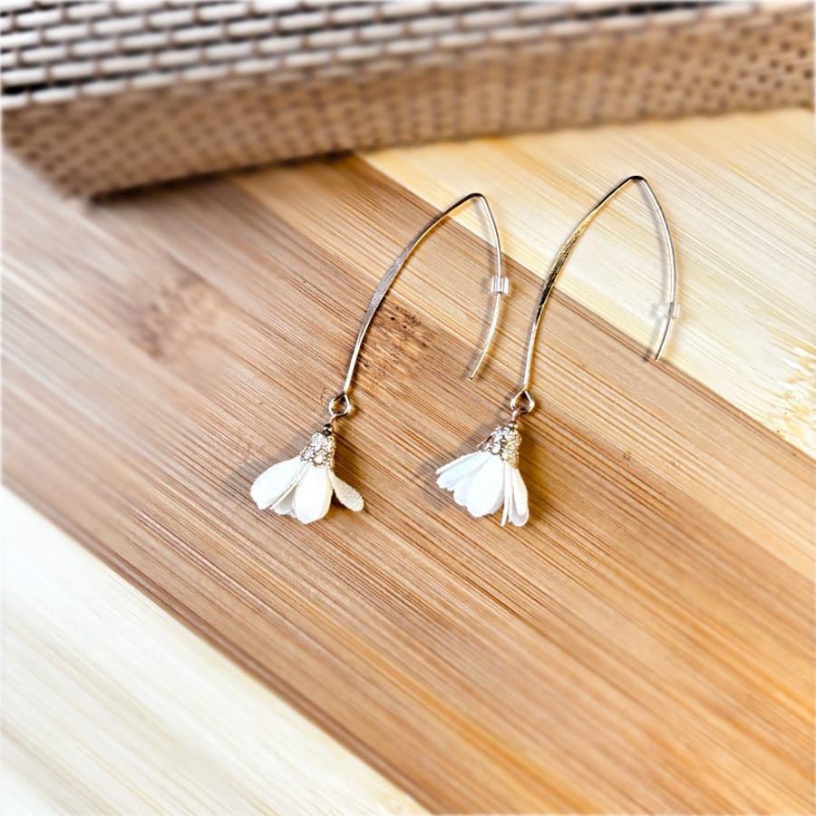 Front view of an earrings - Premium - Hanging White flower Danglers - Zuzus Trove