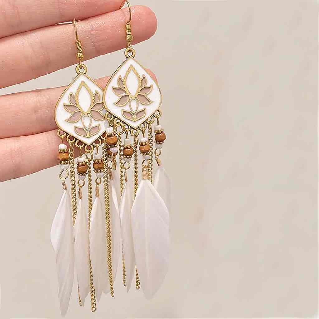 Front view of an earrings - Premium | White Lotus Boho Feather Earrings - Zuzus Trove