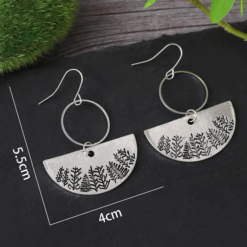 Front view of an earrings - Silver Forest Landscape Earrings - Zuzus Trove