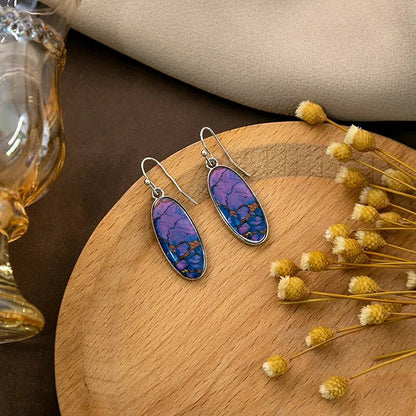 Front view of an earrings - Stone Earrings - Purple Western Style Drop Earrings - Zuzus Trove