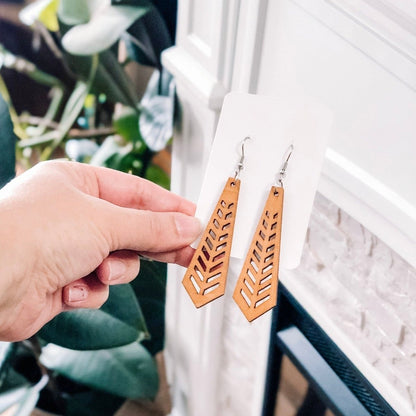 Front view of an earrings - Wood Earrings - Western Tiered Arrow Earrings - Zuzus Trove